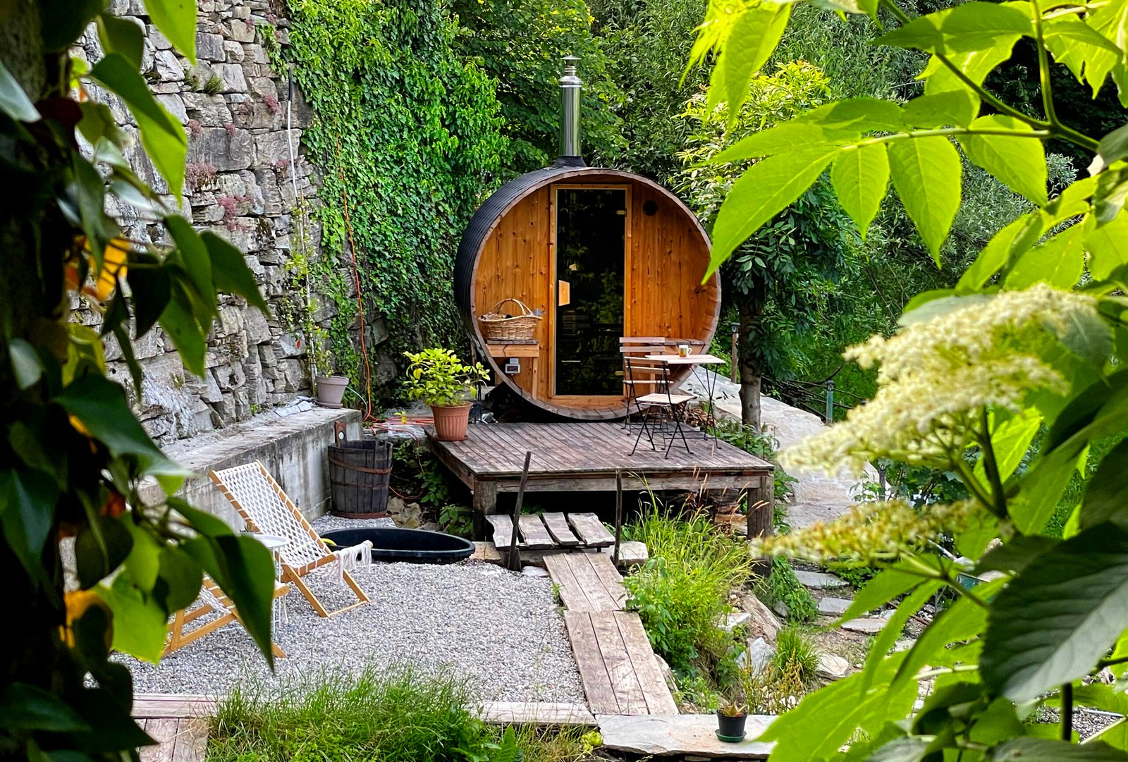 The wood-fired sauna among greenery