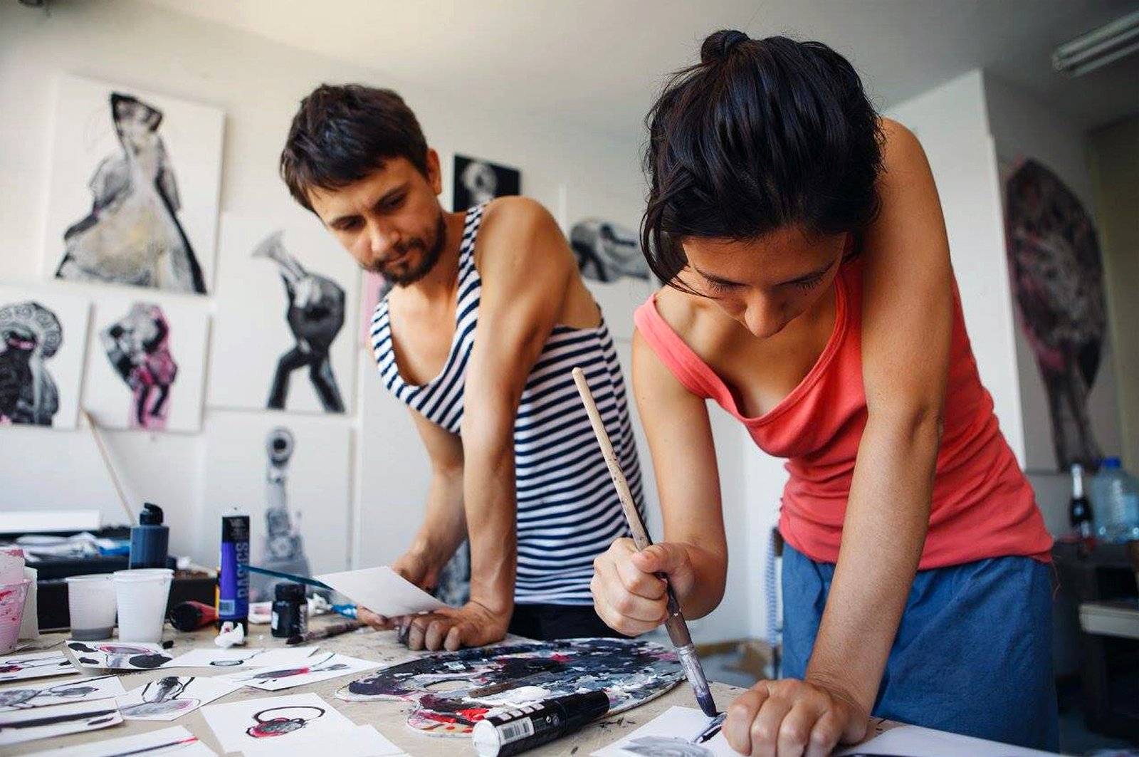 Sergey and Claudia working with portraits