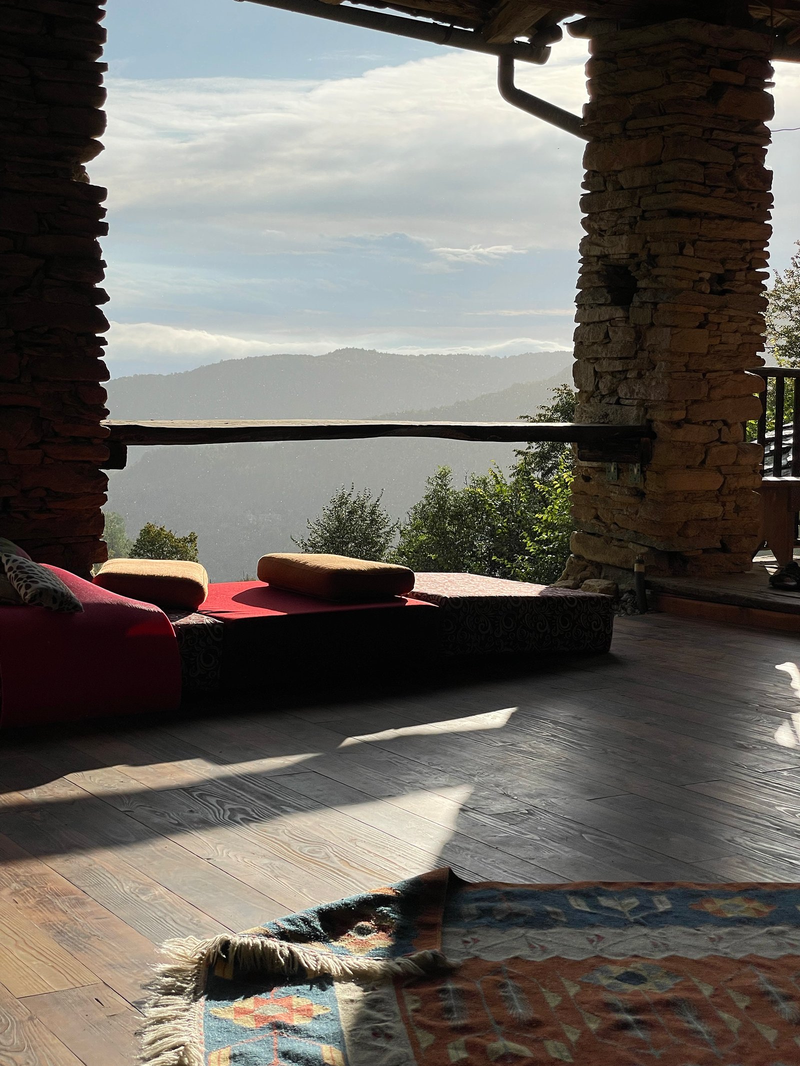 The Hayloft, an open wooden loft above the valley