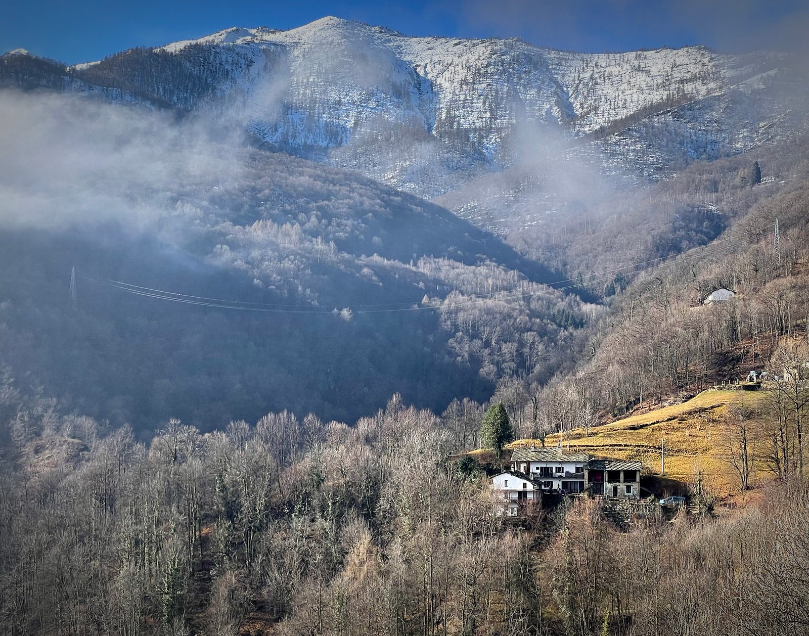Stone Oven House in its mountain landscape