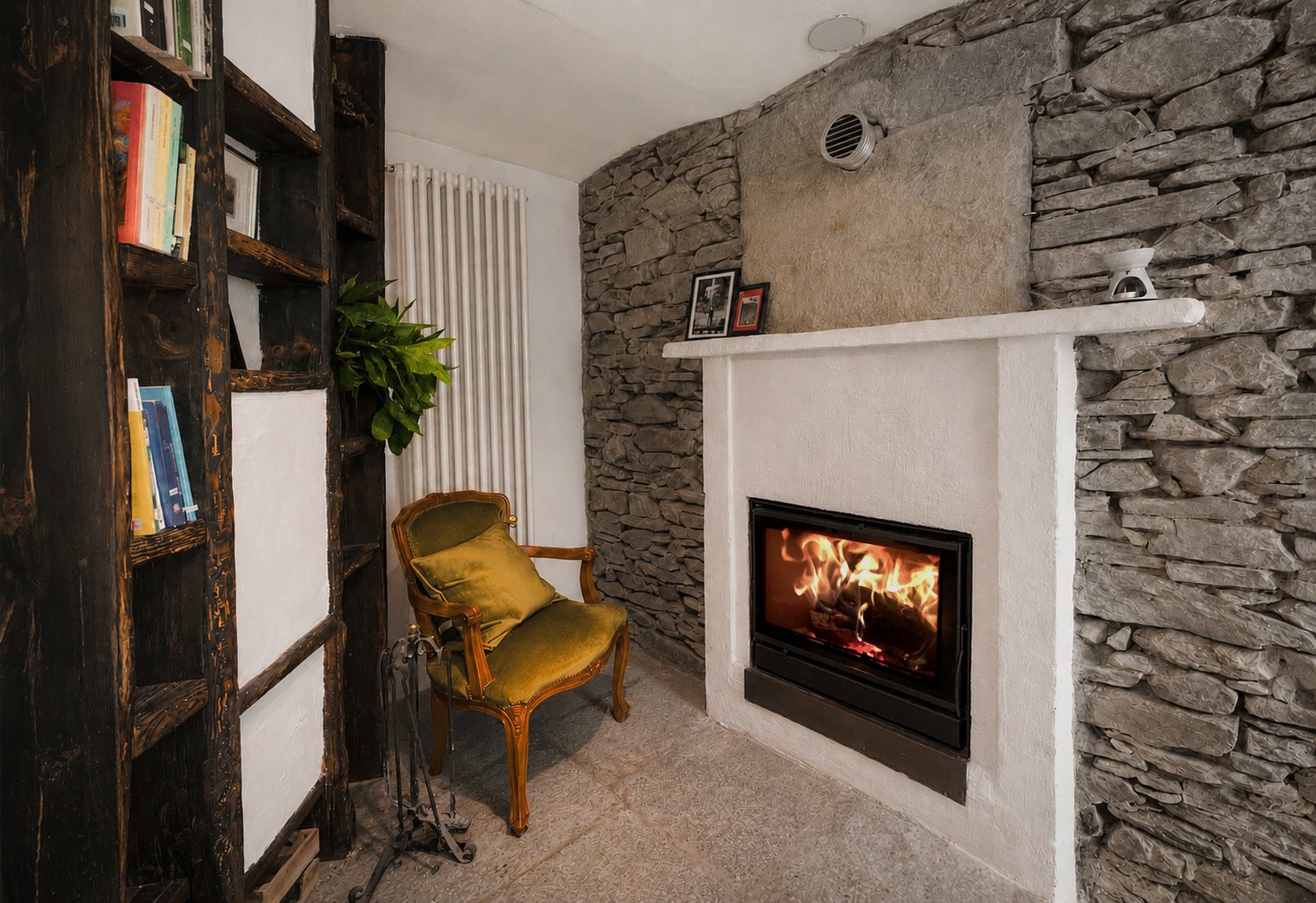 Double-sided fireplace between the living room and the bedroom